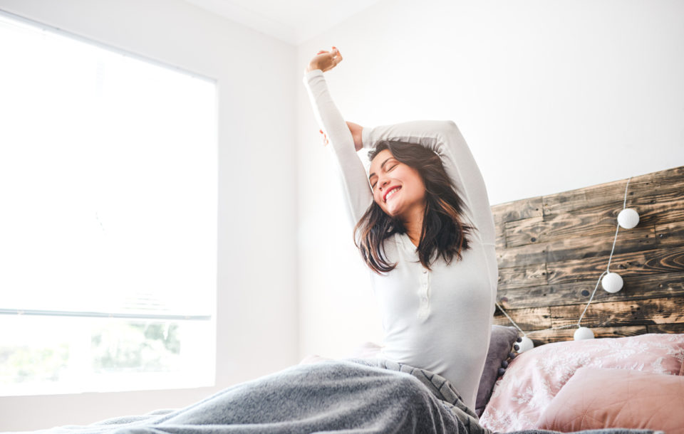 well rested woman waking up