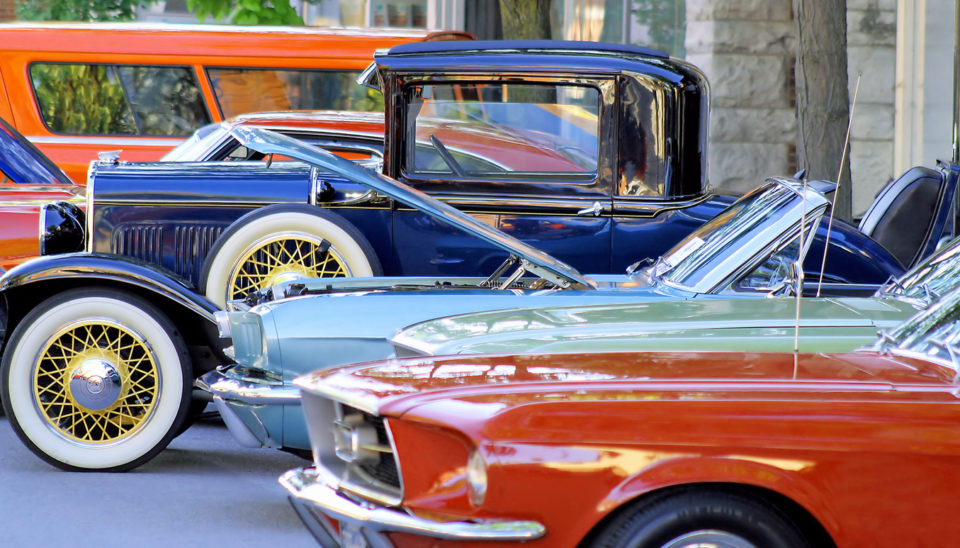 Classic cars parked along street