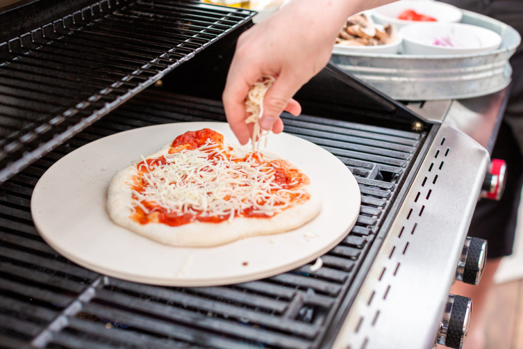 Cooking pizza on outdoor gas grill