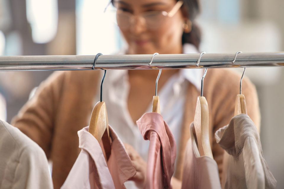 Shot of a young beautiful woman shopping for clothing